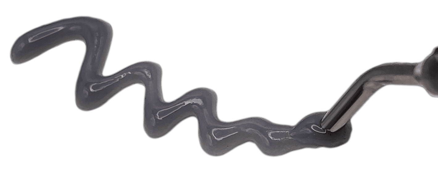 FlexBarrier extruded in a continuous squiggle from the syringe tip — demonstrating bead control
